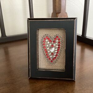 Unique jewel heart in frame.